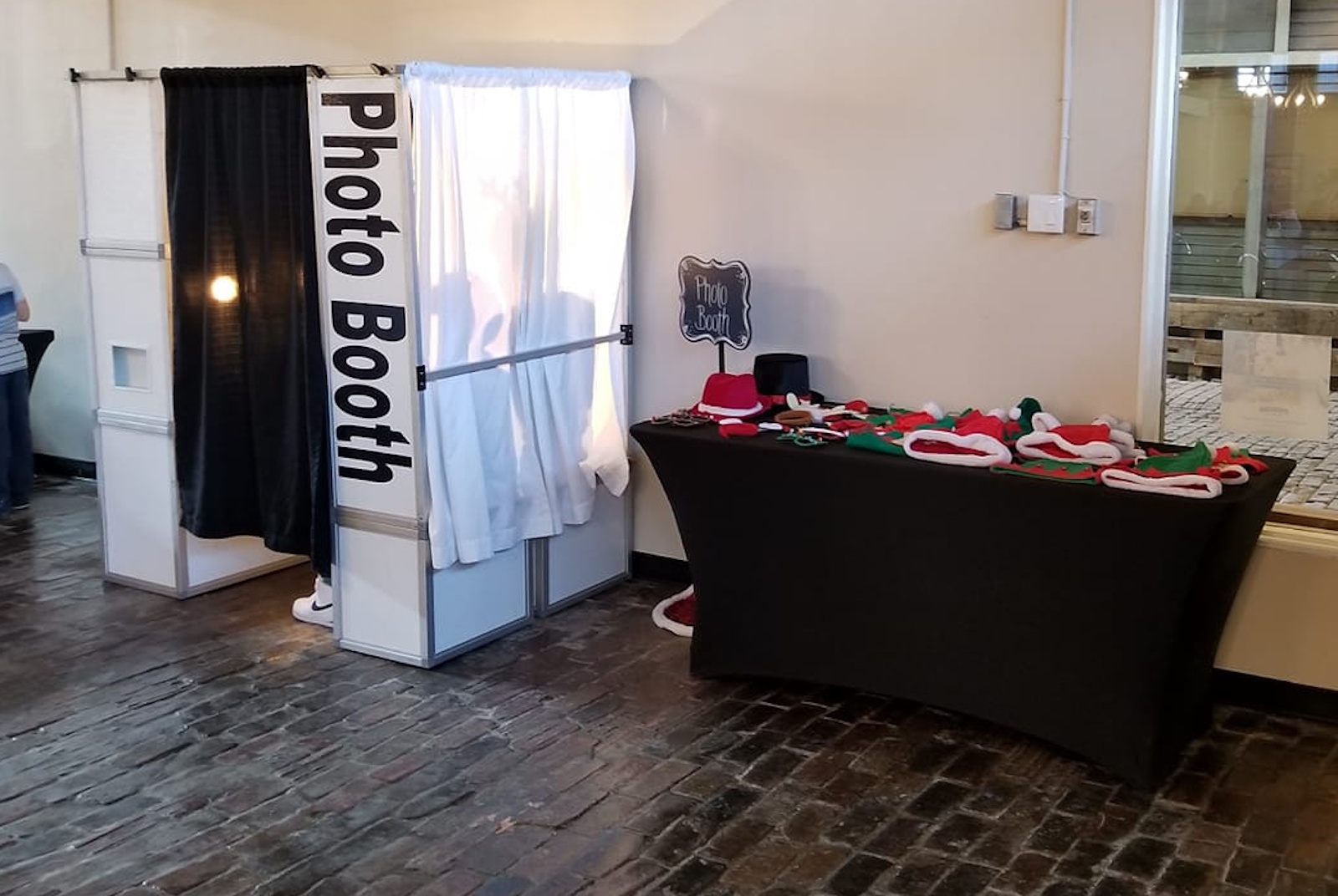 Enclosed photo booth at a holiday party in Dallas Fort Worth